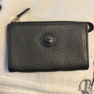 Dooney and Bourke zip up pouch/wallet